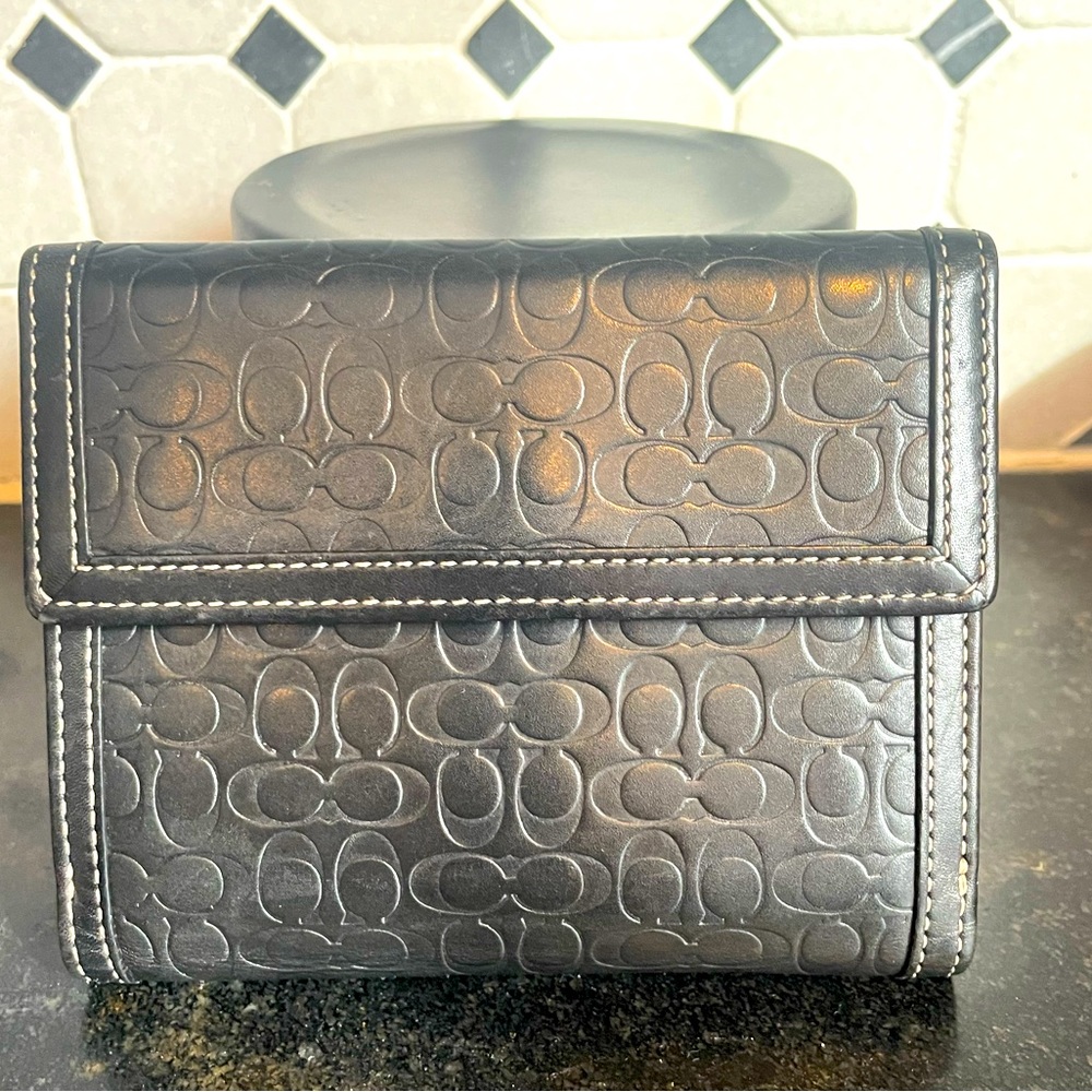 Coach black monogramed leather bifold wallet